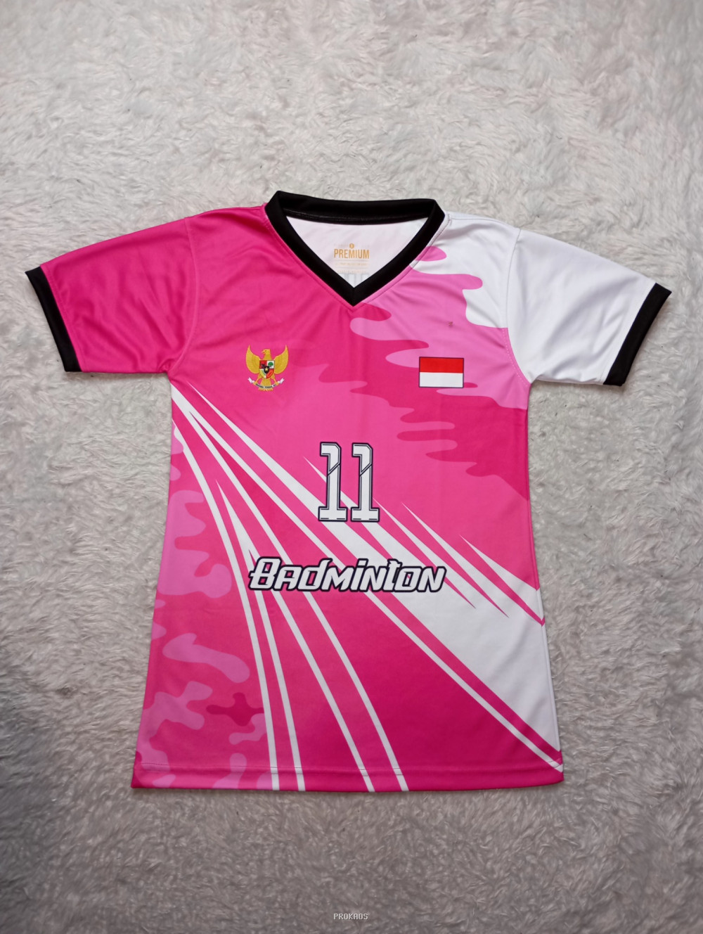 Jersey Badminton Merah Muda dengan Motif Camo dan Logo Garuda - Jersey Custom PROKAOS