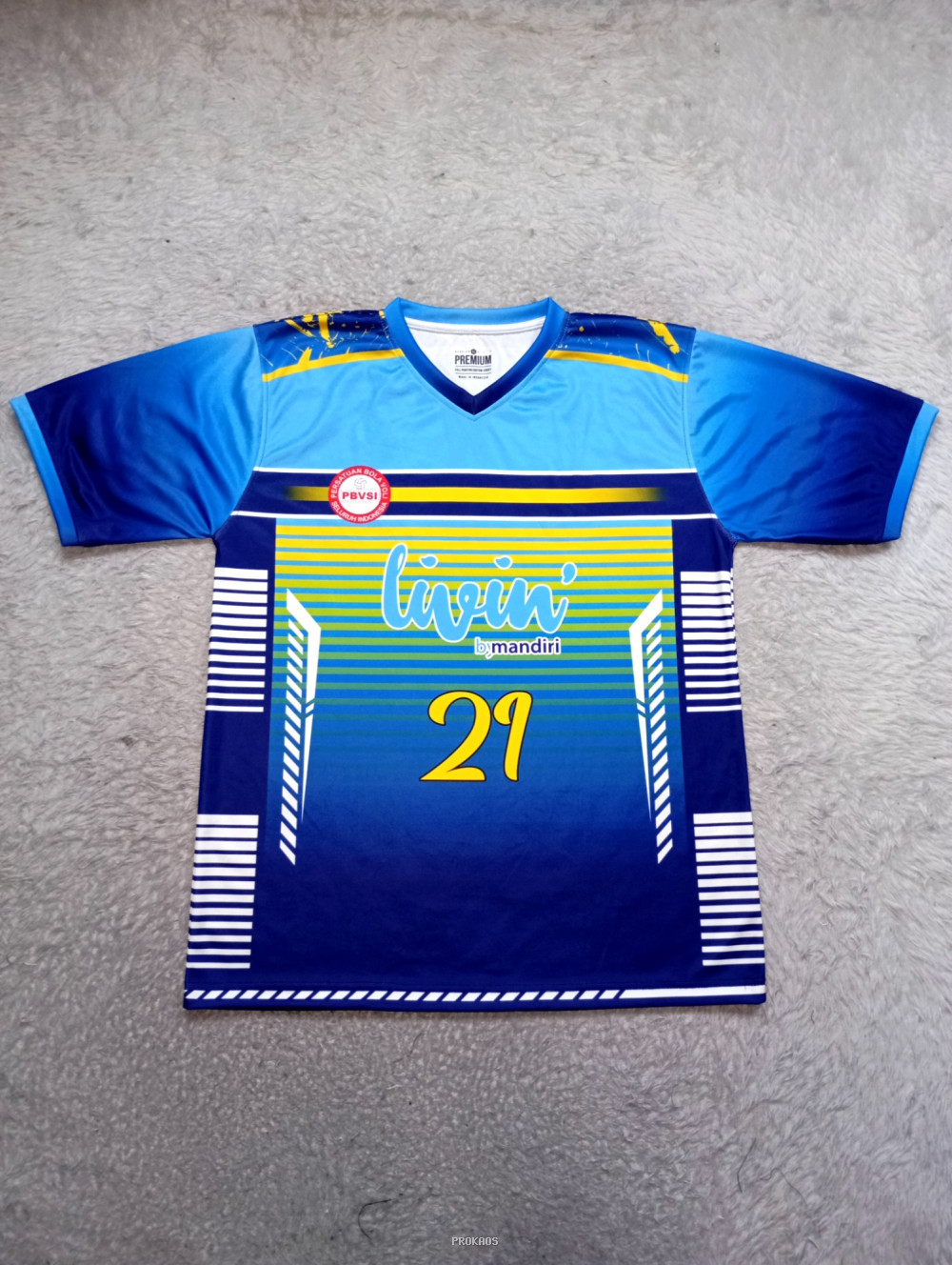 Jersey Voli 'Livin' Mandiri: Biru, Kuning, dan Nomor 21 - Jersey Custom PROKAOS