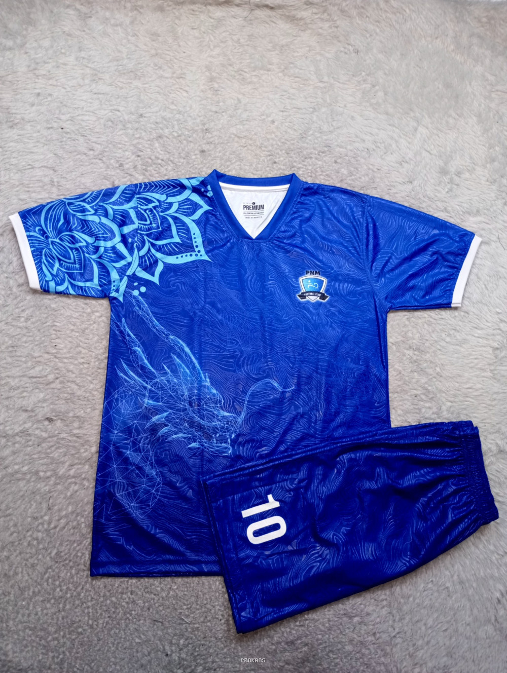 Jersey Sepak Bola Biru dengan Motif Bunga dan Naga - Jersey Custom PROKAOS