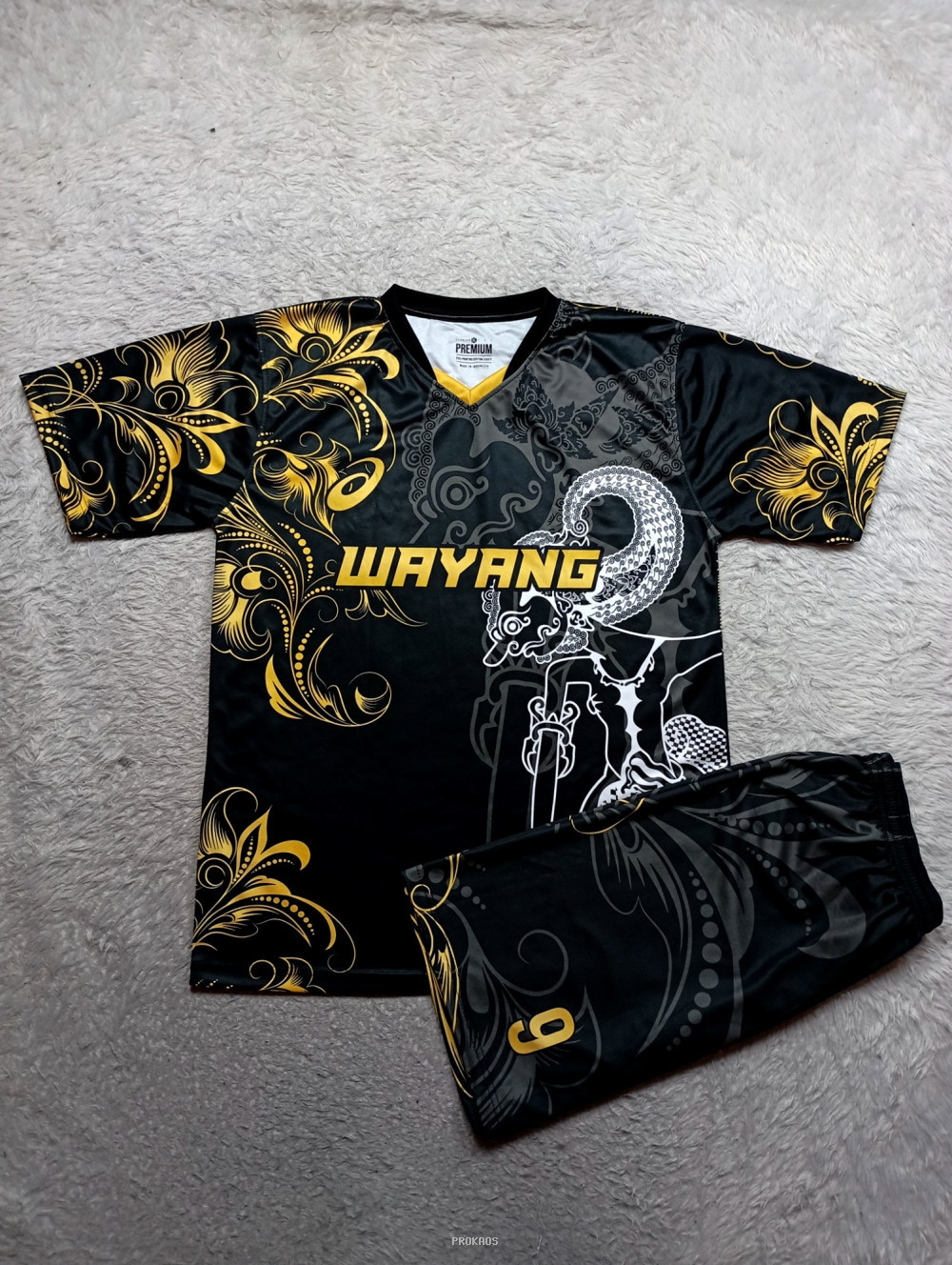 Jersey Wayang: Hitam, Emas, & Motif Wayang Kulit - Jersey Custom PROKAOS