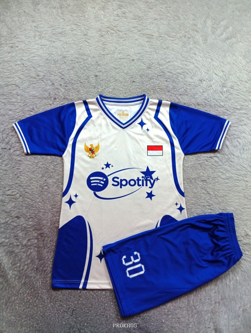 Jersey Bola Putih-Biru dengan Logo Spotify & Garuda Indonesia - Jersey Custom PROKAOS