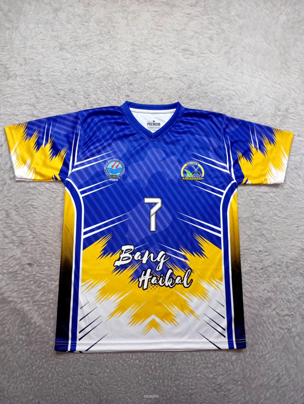Jersey Olahraga Biru-Kuning 'Bang Haikal' dengan Desain Dinamis - Jersey Custom PROKAOS